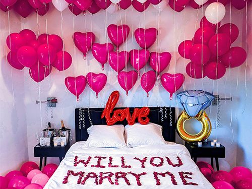 The Romantic Engagement Proposal with Love Room Decoration in Pink