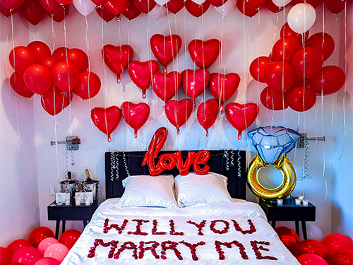 The Romantic Engagement Proposal with Love Room Decoration in Red